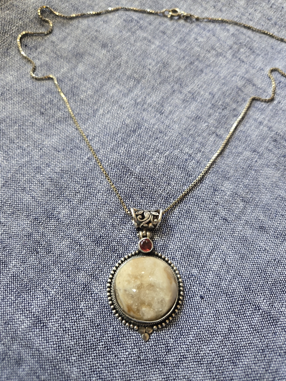 Sterling Silver With Calcite And  Pendant with Garnet Accent.